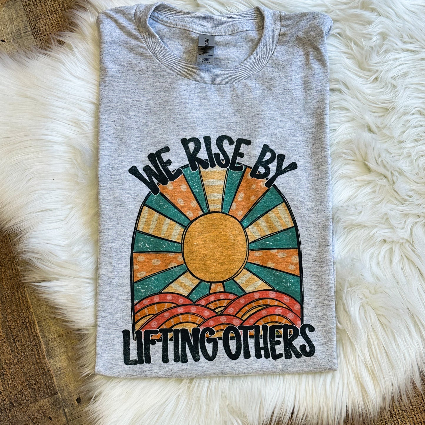 We Rise By Lifting Others